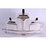 A CONTEMPORARY SILVER PLATED ART DECO STYLE TEASET. 39 cm wide.