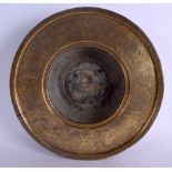 A 16TH/17TH CENTURY MIDDLE EASTERN ISLAMIC MAMLUK BRASS BASIN engraved with Kufic script, foliage