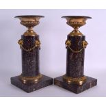 A FINE PAIR OF EARLY 19TH CENTURY EUROPEAN GILT BRONZE PORPHYRY COLUMNS possibly Swedish or