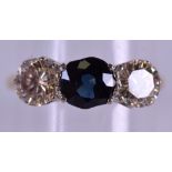 A GOOD 18CT GOLD THREE STONE DIAMOND RING the diamonds approx CT, the sapphire ½ ct. Size P.