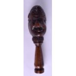 AN 18TH CENTURY CARVED TREEN FIGURAL NUT CRACKER in the form of Punch. 15 cm long.