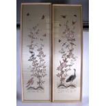 A LARGE PAIR OF EARLY 20TH CENTURY CHINESE FRAMED SILK PANELS depicting birds and butterflies