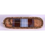 AN ANTIQUE SCOTTISH BANDED AGATE BROOCH. 7.5 cm long.