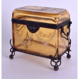 AN UNUSUAL 19TH CENTURY BOHEMIAN AMBER GLASS CASKET painted with birds watching a beetle within a