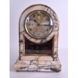 A RARE VEINED MARBLE BULLE CLOCK with large silvered dial and visible mechanism. 39 cm x 26 cm.