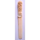 A MID 19TH CENTURY EUROPEAN CARVED IVORY PAPER KNIFE decorated with fruiting vines and foliage. 22