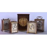 A GROUP OF CARRIAGE CLOCKS, together with an Atlantic mantel clock. Largest 18.5 cm high. (5)