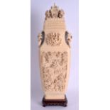 A MASSIVE 19TH CENTURY CHINESE CANTON CARVED IVORY VASE AND COVER Late Qing, exceptionally carved