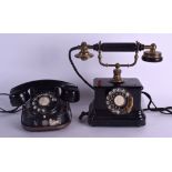 A VINTAGE MFG BELL TELEPHONE together with another early telephone with Bakelite button. 22 cm &