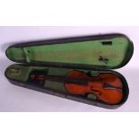 A CASED TWO PIECE BACK VIOLIN by Stainer. 50 cm long.