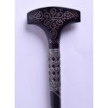 A 19TH CENTURY CONTINENTAL SILVER INLAID PIQUE WORK EBONY WALKING CANE decorated with swirling