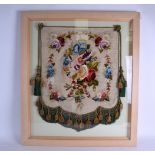 AN EARLY VICTORIAN FRAMED HANGING EMBROIDERED PANEL decorated with bold foliage. Panel 48 cm x 62