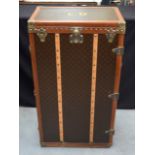 A LOVELY LARGE LOUIS VUITTON TRAVELLING WARDROBE TRUNK with L D monogram, the interior with fixtures