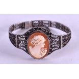 AN ANTIQUE SILVER AND CAMEO LADIES BRACELET.