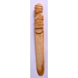 A MID 19TH CENTURY FRENCH CARVED IVORY PAPER KNIFE formed as a Napoleonic solider. 25 cm long.