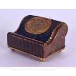 A RARE VICTORIA MINIATURE GOUT STOOL in the form of a pen wipe, with upholstered backing. 5.5 cm x 3