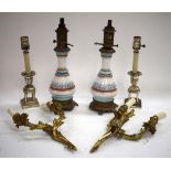 A PAIR OF PAINTED VICTORIAN CERAMIC LAMPS, together with a bronze sconce, and pair of plated