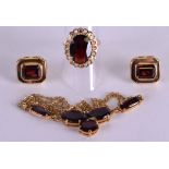 A SUITE OF 14CT GOLD AND GARNET JEWELLERY including a pair of earrings, necklace and ring. (4)