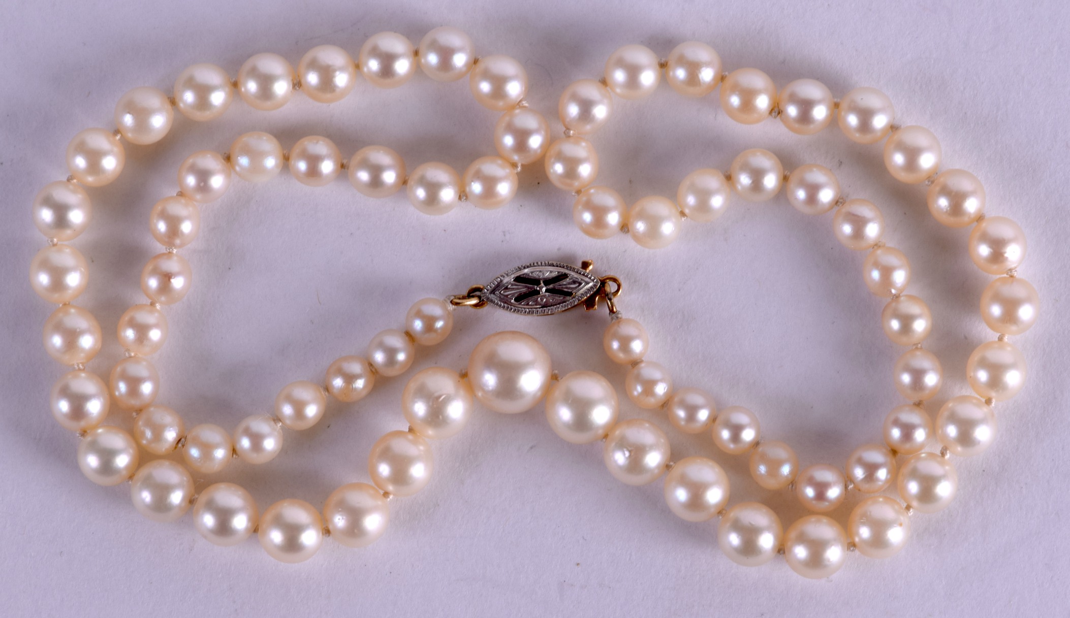 A CULTURED PEARL NECKLACE. 40 cm long.