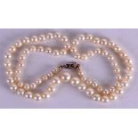 A CULTURED PEARL NECKLACE. 40 cm long.