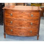 A GEORGE III MAHOGANY CHEST OF DRAWERS, with bronze lion mark head handles, three long drawers on