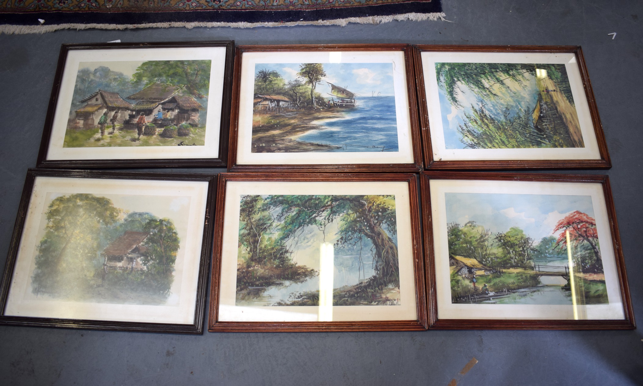 A GROUP OF SIX SOUTHEAST ASIAN WATERCOLOURS, landscape scenes. 24 cm x 33 cm.