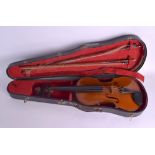 A CASED EARLY 20TH CENTURY FRENCH VIOLIN with two bows, by Michel Couturieux. Violin 59 cm long. (