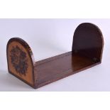 AN UNUSUAL VICTORIAN TUNBRIDGEWARE SLIDING BOOK RACK one end with geometric motifs, the other with a