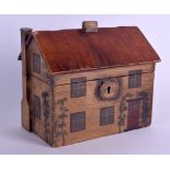 A REGENCY STYLE PAINTED WOODEN HOUSE TEA CADDY AND COVER formed with thatched windows. 21 cm x 18