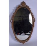 A 20TH CENTURY GILTWOOD MIRROR, with floral decoration. 68 cm x 41 cm.