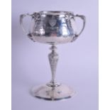 A STYLISH ARTS AND CRAFTS TRI HANDLED PRESENTATION CUP by Charles Edwards, London 1903. 18.6 oz.