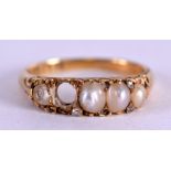 AN ANTIQUE 18CT GOLD AND PEARL RING. Size I/J.