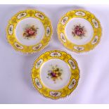 A SET OF THREE ROYAL WORCESTER PAINTED DESSERT PLATES one by Albert Shuck, painted with fruiting