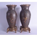 A LOVELY LARGE PAIR OF 19TH CENTURY JAPANESE MEIJI PERIOD BRONZE ONLAID VASES decorated in relief