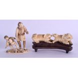 A 19TH CENTURY CHINESE CARVED IVORY DOUBLE BUDDHIST LION GROUP together with a Meiji period ivory