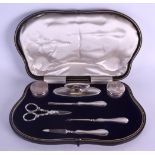 A 1940S ENGLISH SILVER MANICURE SET within original fitted box. Birmingham 1949. (7)