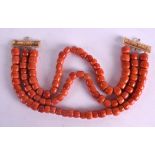 AN 18CT GOLD THREE STRAND RED CORAL NECKLACE. 160 grams. 49 cm long.