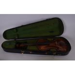 AN EARLY 20TH CENTURY CASED ONE PIECE BACK VIOLIN by STAINER. 59 cm long.