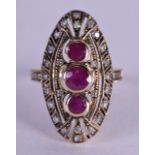 AN ART DECO STYLE 9 CT GOLD RUBY AND DIAMOND RING. Size O/P.