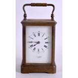 A J W BENSON BRASS CARRIAGE CLOCK with white enamel dial and black numerals. 16.5 cm high incl