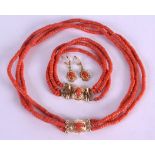 A SUITE OF 18CT GOLD AND CORAL JEWELLERY including a necklace, earrings and bracelet. (4)