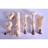 A COLLECTION OF 18TH/19TH CENTURY EUROPEAN CARVED IVORY SEALS AND CANE HANDLES in the form of