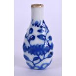 A 19TH CENTURY CHINESE BLUE AND WHITE PORCELAIN SNUFF BOTTLE Qing, painted with floral sprays. 6.
