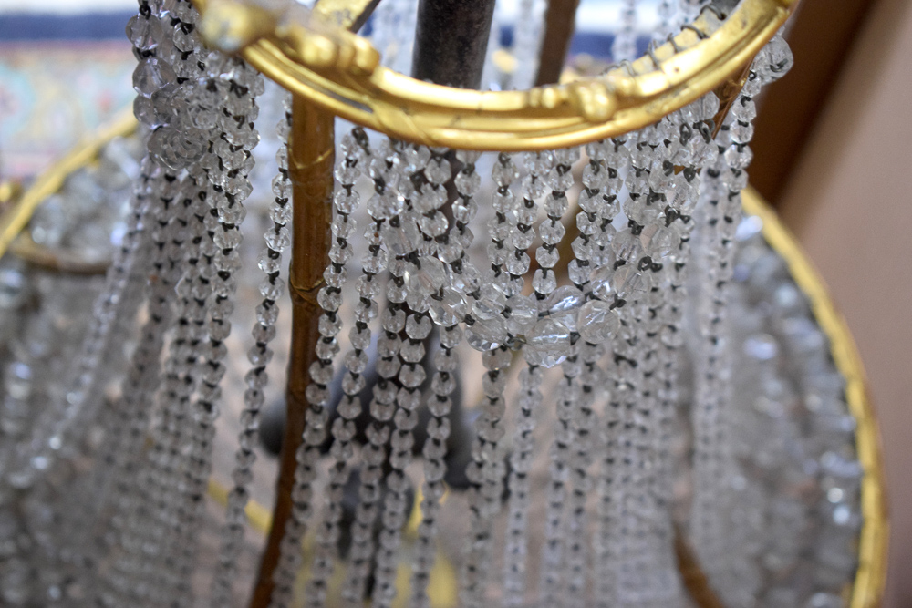 A GOOD ANTIQUE CHANDELIER, formed with spherical facetted glass droplets and ormolu floral swag - Image 7 of 7