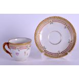 20th c. Royal Copenhagen Flora Danica coffee cup and saucer painted with Azalea lapponica, artist