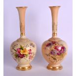 Royal Worcester pair of blush ivory globular vases with tall neck painted with flowers date code for