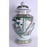 A LARGE 19TH CENTURY CHINESE FAMILLE VERTE BALUSTER VASE AND COVER Kangxi style, painted with