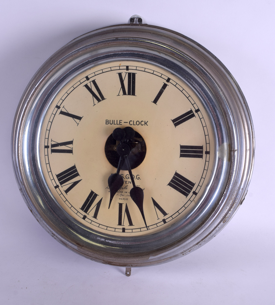 AN ELECTRIC BULLE CHROMED WALL CLOCK S G D G patent. 33 cm diameter.