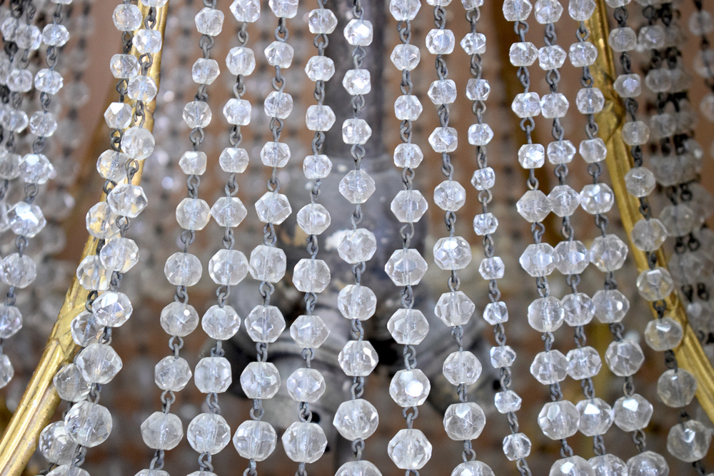 A GOOD ANTIQUE CHANDELIER, formed with spherical facetted glass droplets and ormolu floral swag - Image 3 of 7