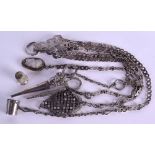 A 19TH CENTURY CONTINENTAL CHATELAINE formed with a pair of manicure scissors, propelling pencils, a